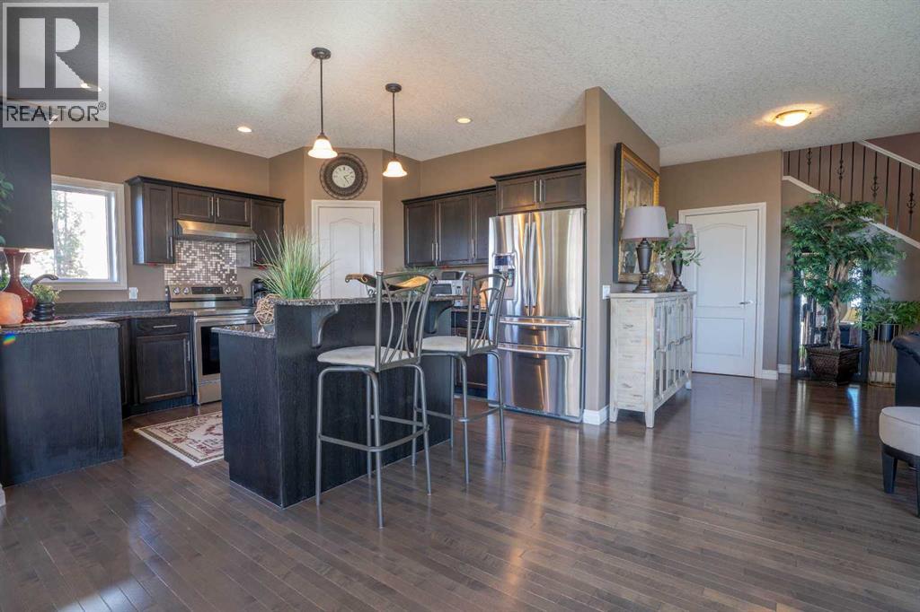 460 Sunset Link, Crossfield, Alberta  T0M 0S0 - Photo 13 - A2347495
