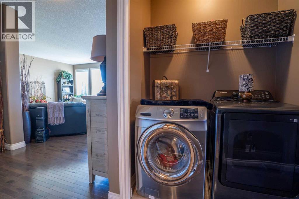 460 Sunset Link, Crossfield, Alberta  T0M 0S0 - Photo 24 - A2347495