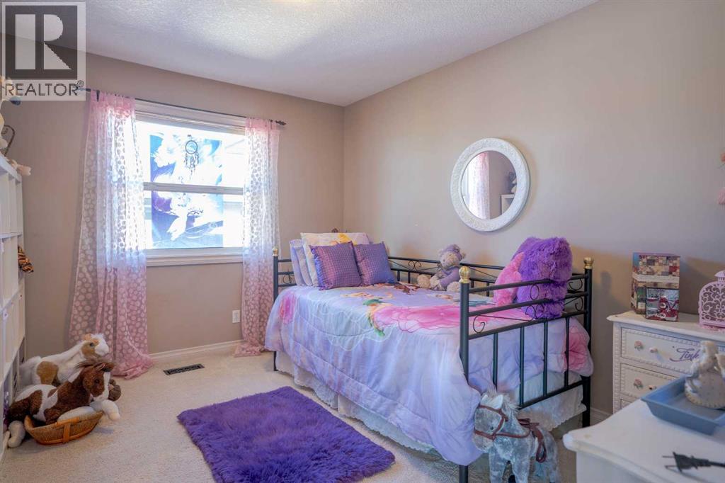 460 Sunset Link, Crossfield, Alberta  T0M 0S0 - Photo 31 - A2347495