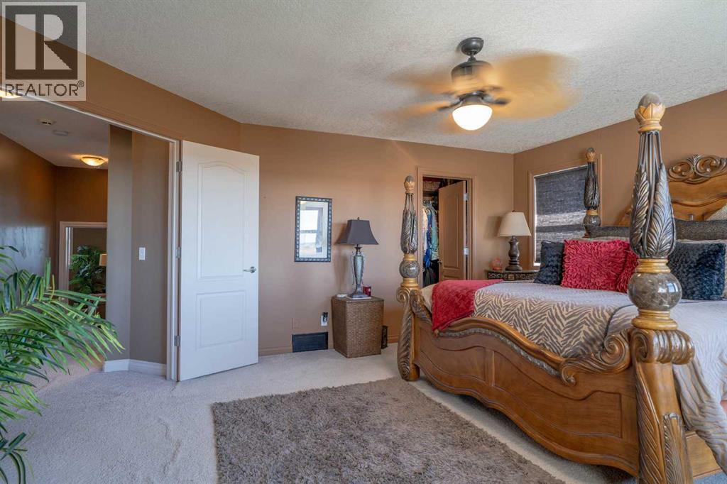 460 Sunset Link, Crossfield, Alberta  T0M 0S0 - Photo 33 - A2347495