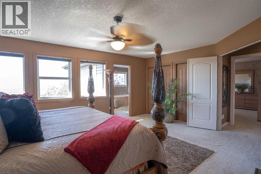460 Sunset Link, Crossfield, Alberta  T0M 0S0 - Photo 34 - A2347495