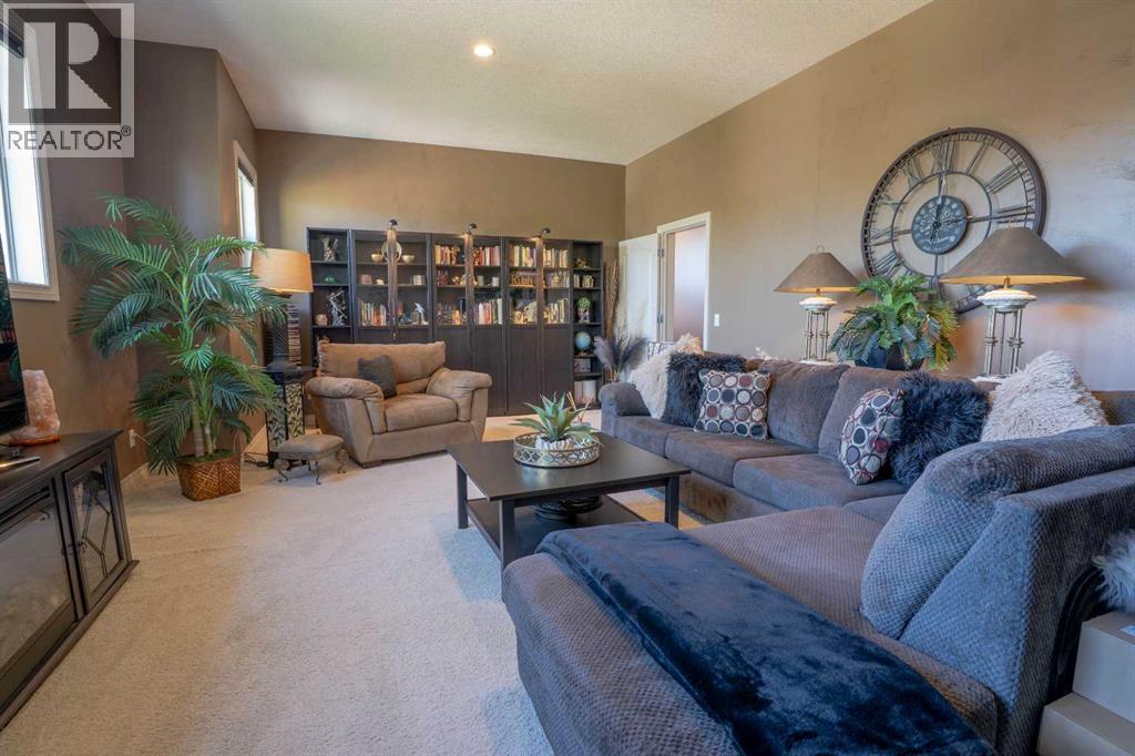 460 Sunset Link, Crossfield, Alberta  T0M 0S0 - Photo 30 - A2347495
