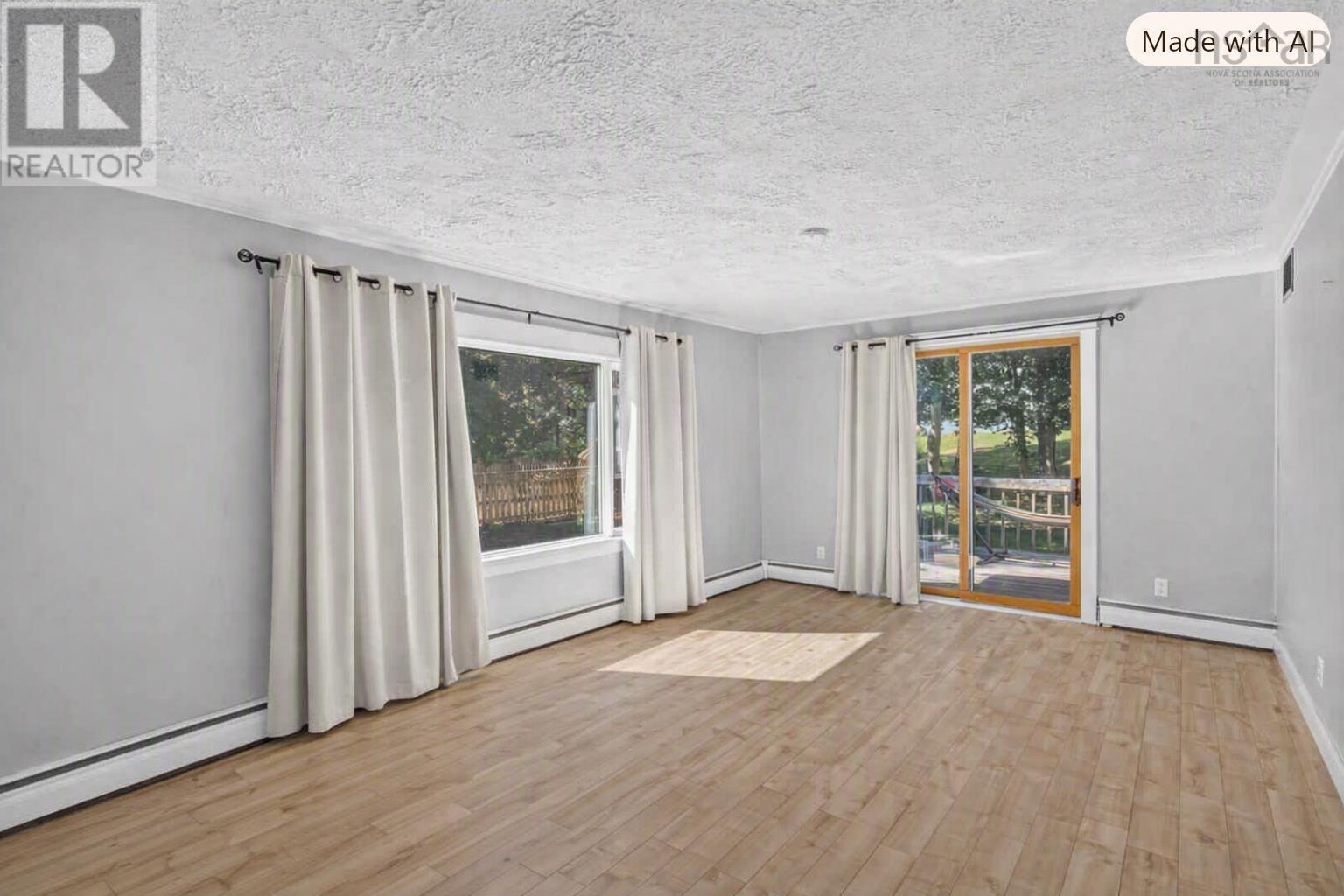 Living Room with patio doors to back patio.