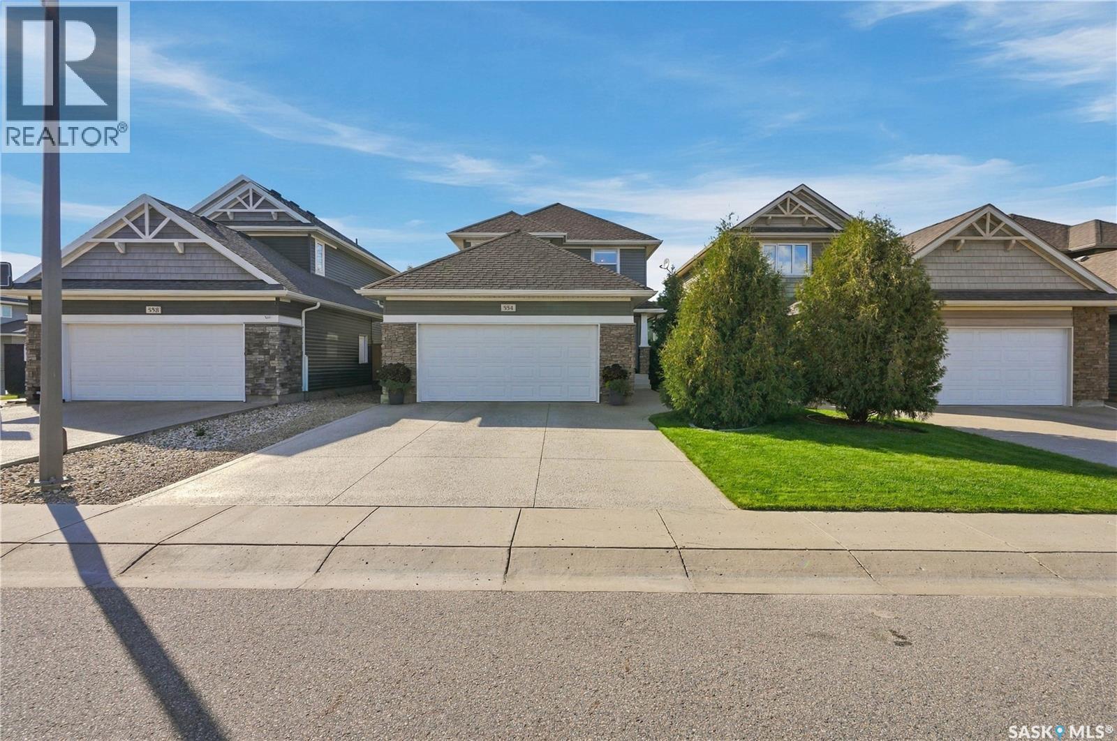 554 Kolynchuk Crescent, Saskatoon, Saskatchewan S7T 0V9 - Photo 1 - SK048992
