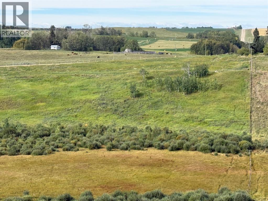 Looking West. Trees above nbottom land is potential build site