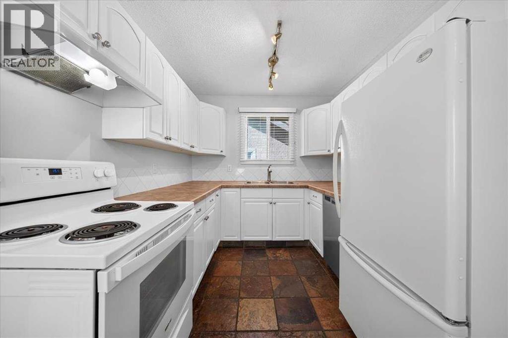 1424 11 Avenue Se, Calgary, Alberta  T2G 0Z8 - Photo 9 - A2343621