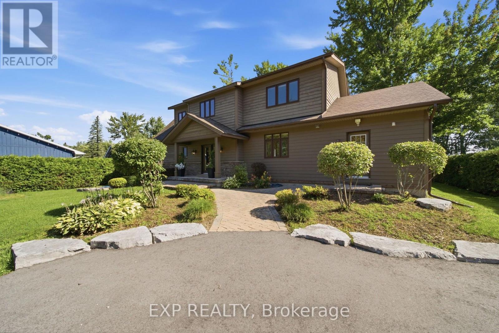 Classic curb appeal and mature landscaping