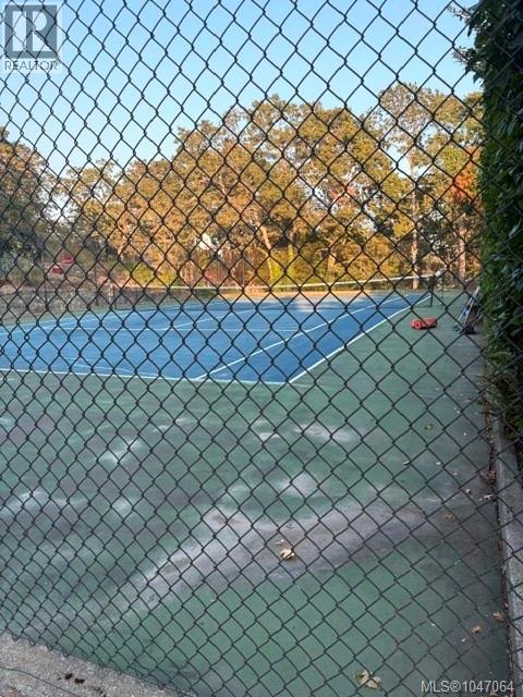 Tennis anyone? Strata owns a full size tennis court!