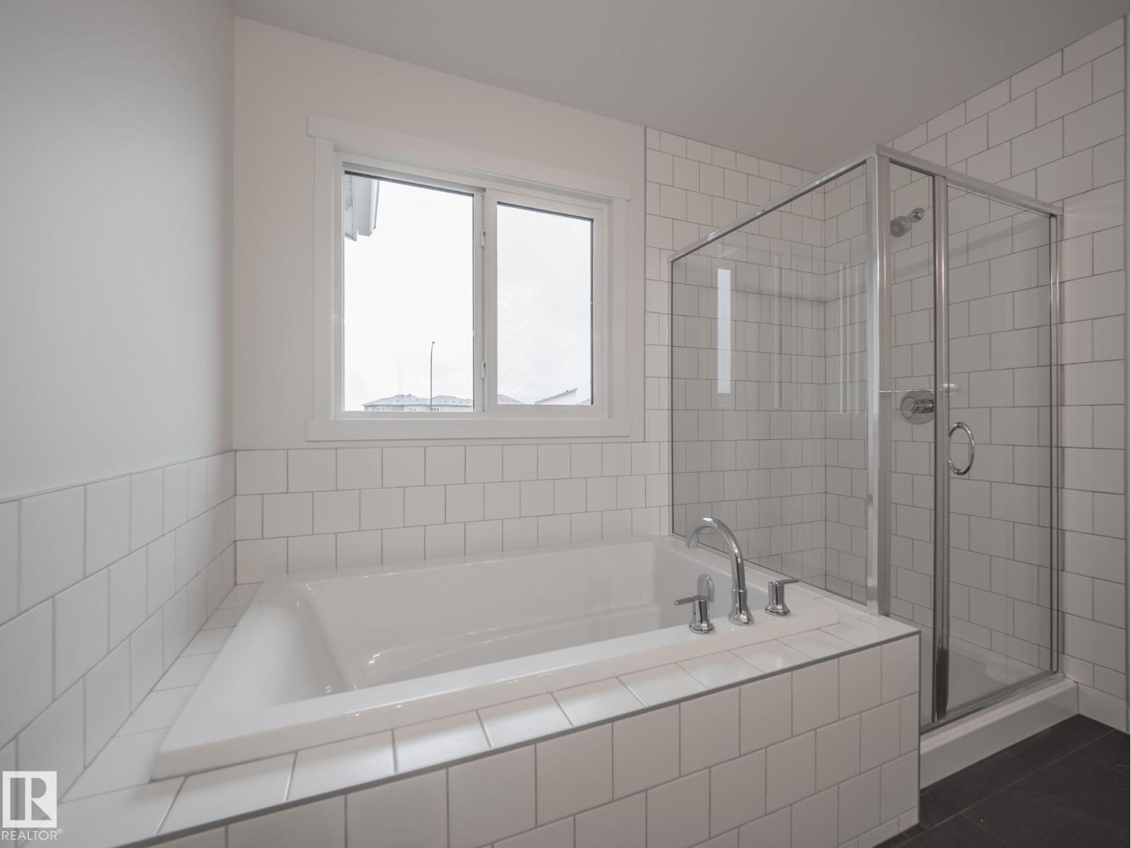 20735 24 AV NW
