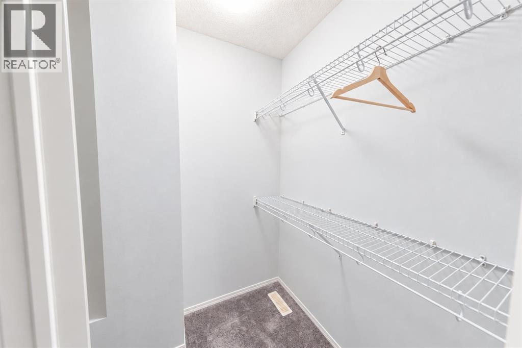 308 Toscana Gardens NW photo 25