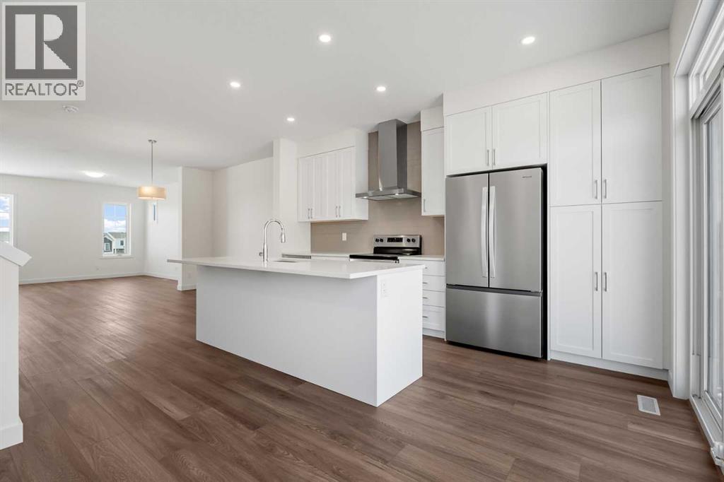 1147 Fowler Road SW, Airdrie, Alberta  T4B 5M6 - Photo 4 - A2342686