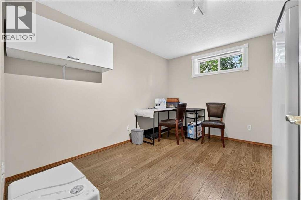 Bedroom four in the basement, also makes great sewing room, gym, flex space. Note: window might not meet current Egress rules