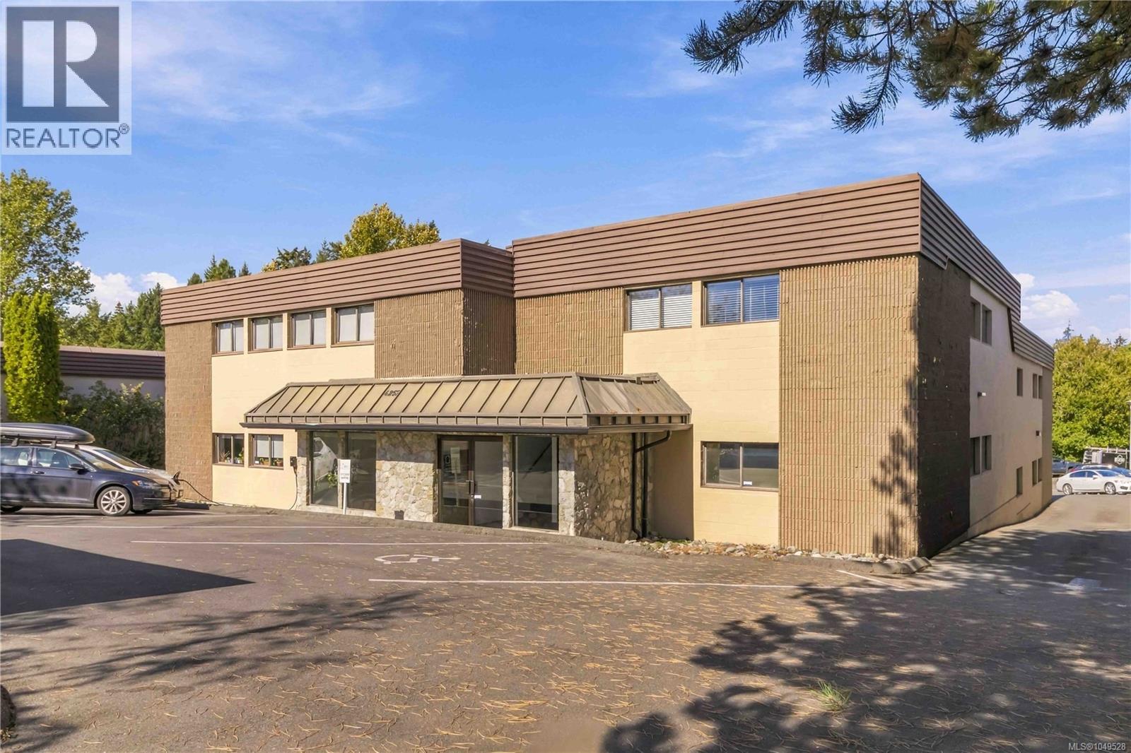 200 4252 Commerce Cir, Saanich, British Columbia V8Z 4M2 - Photo 1 - 1049528