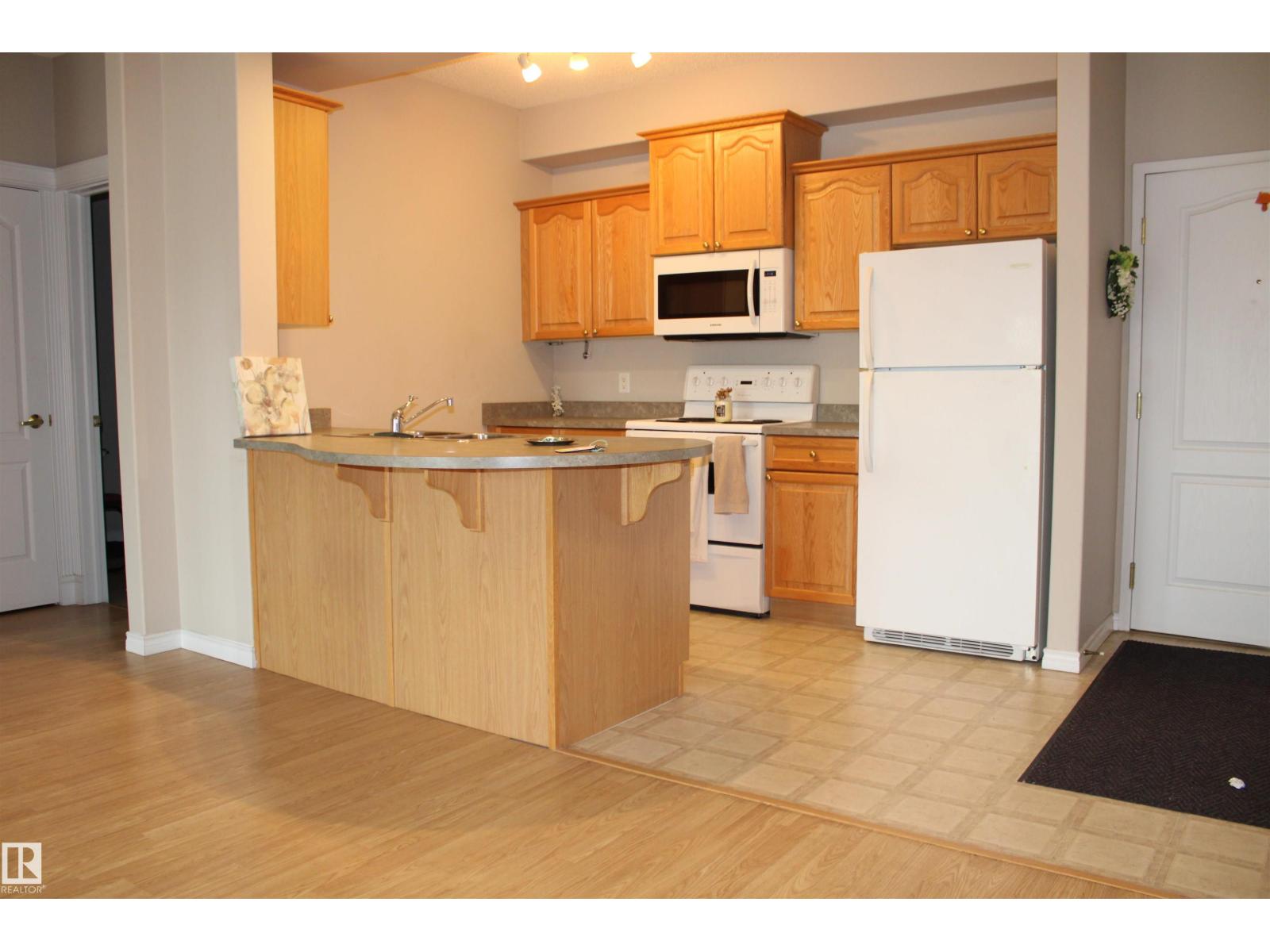 #212 14259 50 ST N NW photo 3