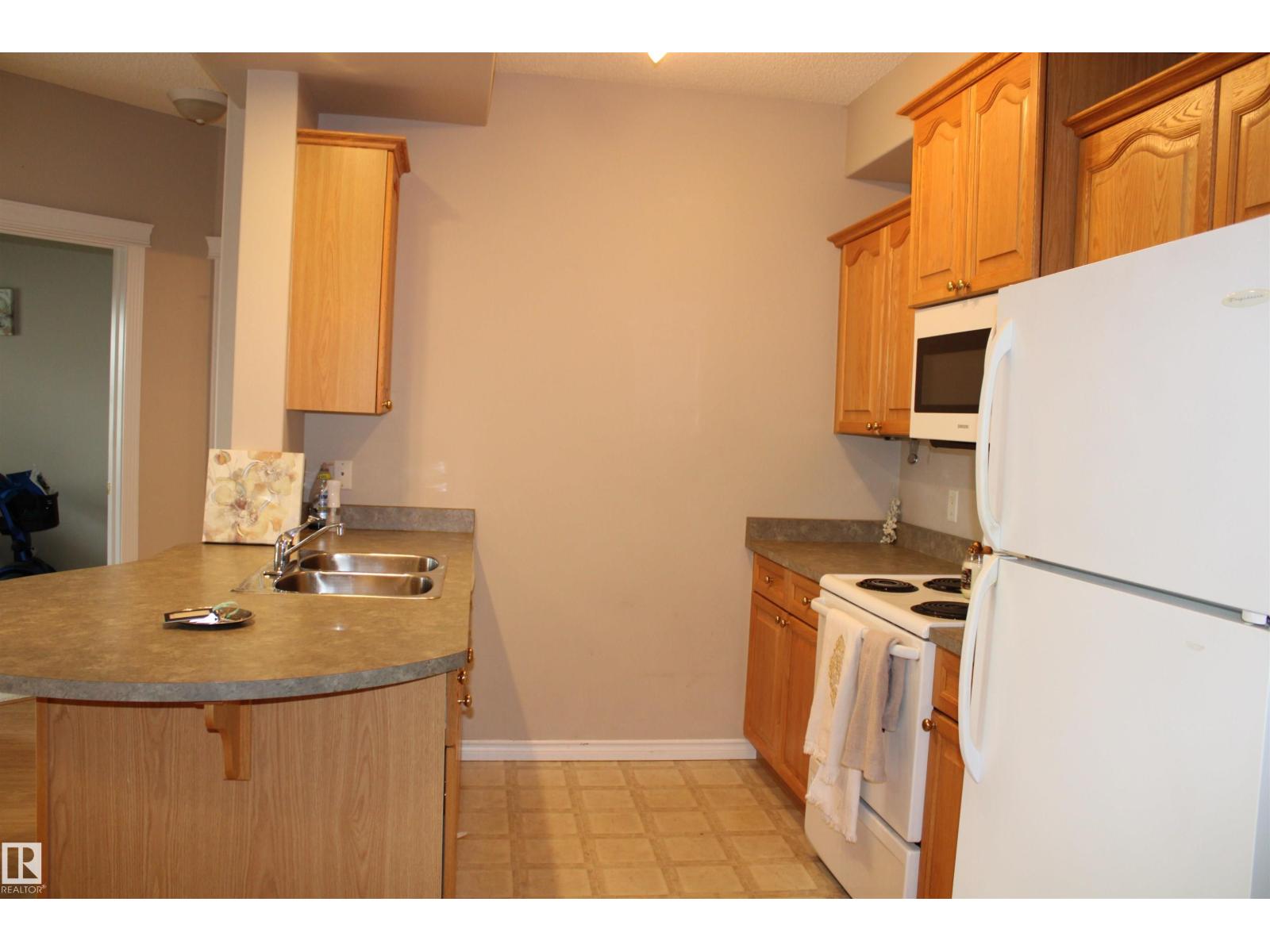 #212 14259 50 ST N NW photo 6