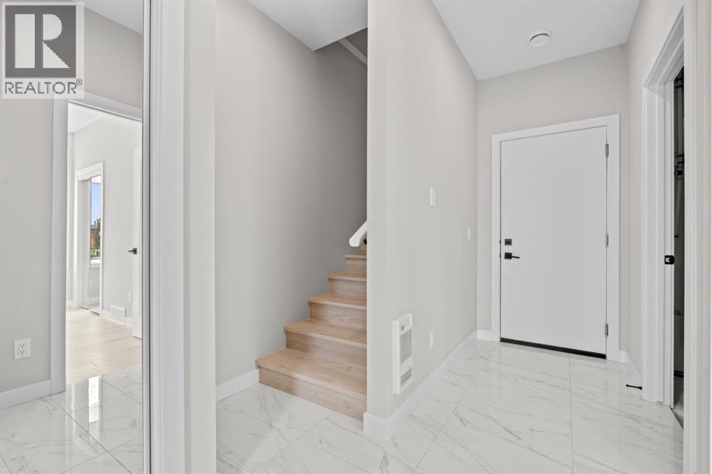 203, 8155 8 Avenue SW, Calgary, Alberta  T3H 6B1 - Photo 5 - A2318061