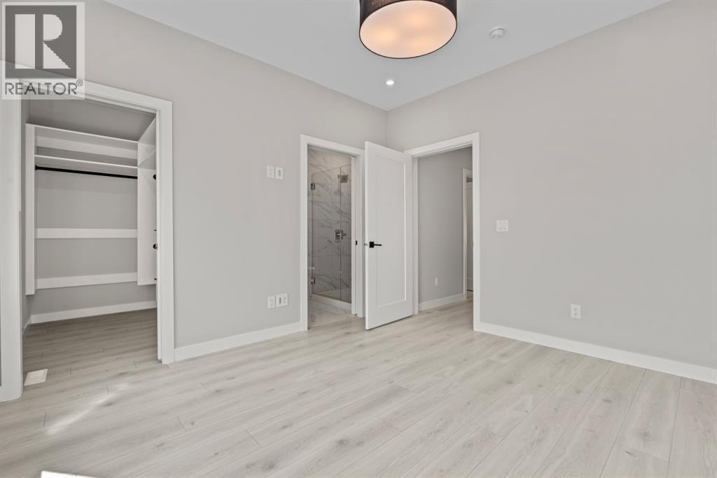 203, 8155 8 Avenue SW, Calgary, Alberta  T3H 6B1 - Photo 19 - A2318061