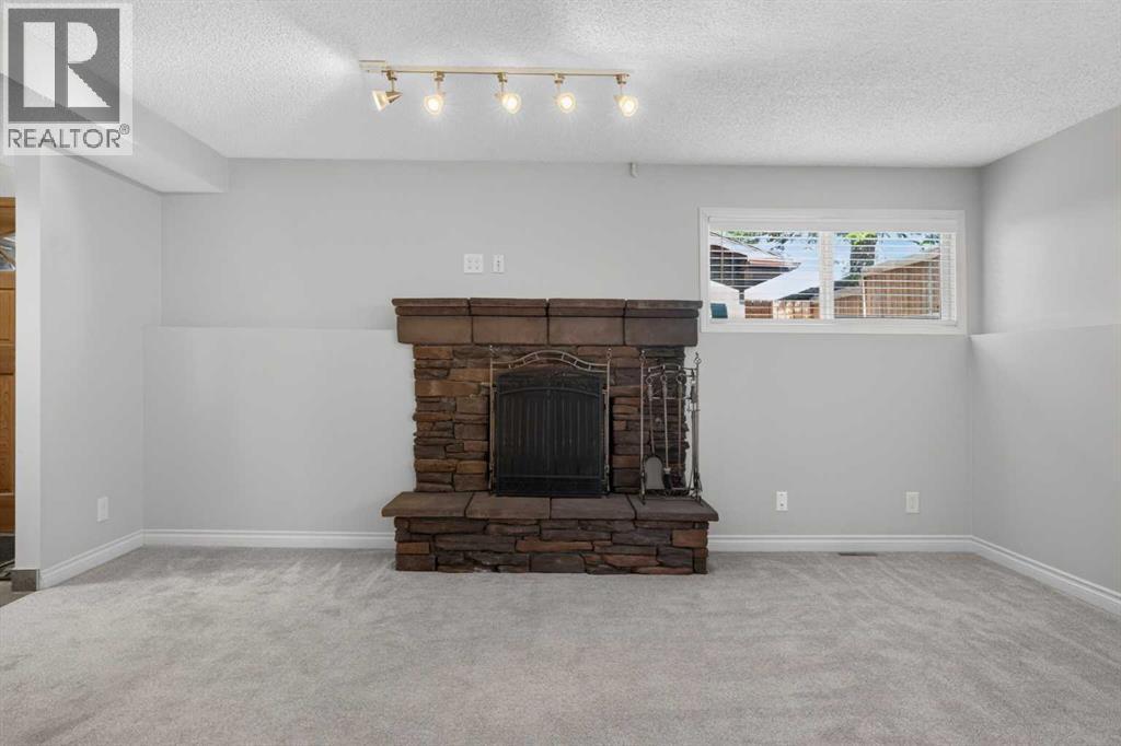 112 Beaconsfield Rise NW, Calgary, Alberta  T3K 1X4 - Photo 25 - A2347791