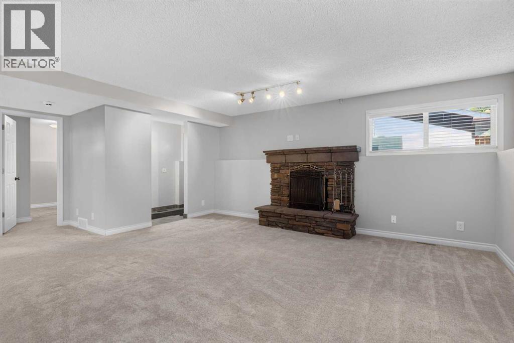 112 Beaconsfield Rise NW, Calgary, Alberta  T3K 1X4 - Photo 27 - A2347791