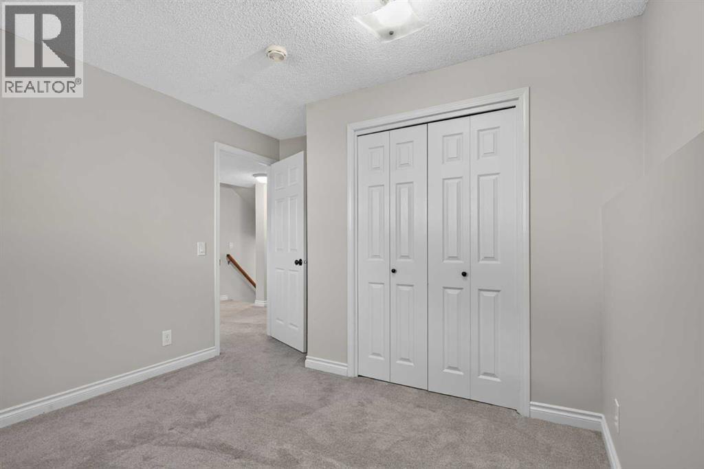 112 Beaconsfield Rise NW, Calgary, Alberta  T3K 1X4 - Photo 29 - A2347791