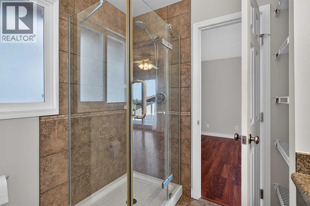112 Beaconsfield Rise NW, Calgary, Alberta  T3K 1X4 - Photo 23 - A2347791