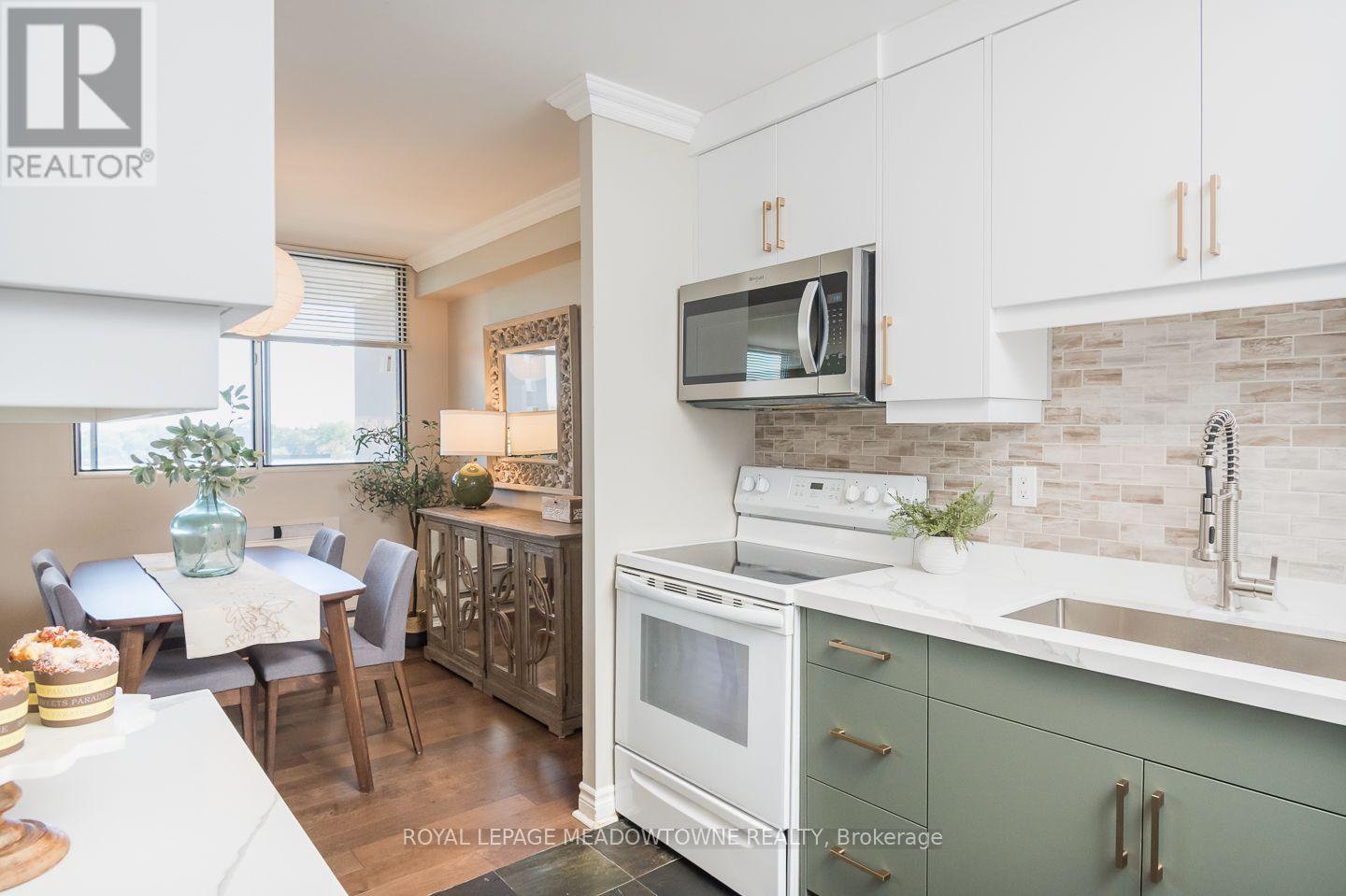 704 - 81 Millside Drive, Milton (Om Old Milton), Ontario  L9T 3X4 - Photo 6 - W13823258