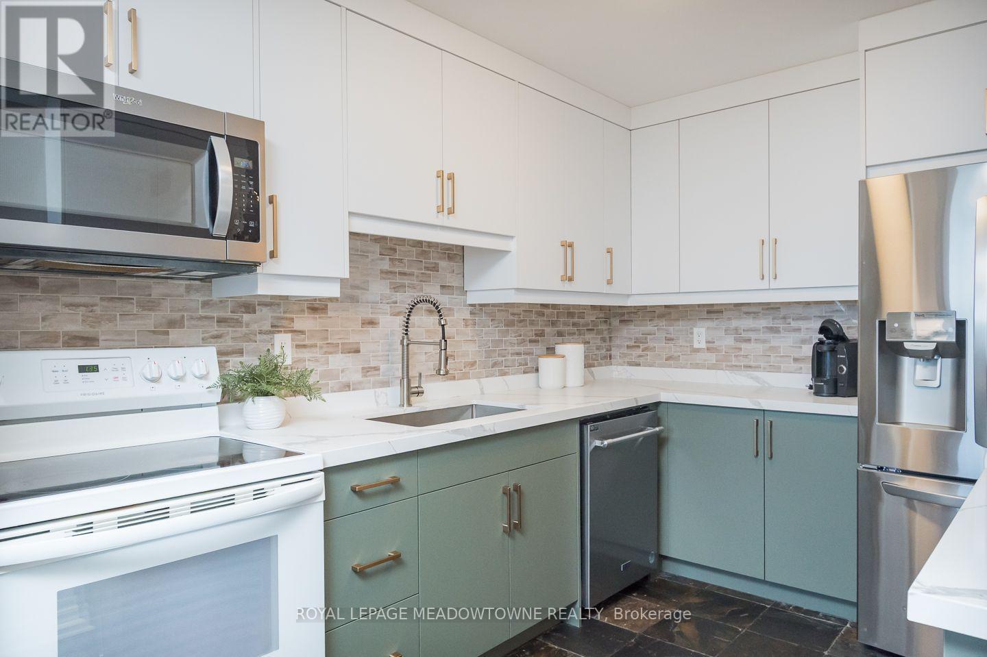 704 - 81 Millside Drive, Milton (Om Old Milton), Ontario  L9T 3X4 - Photo 8 - W13823258