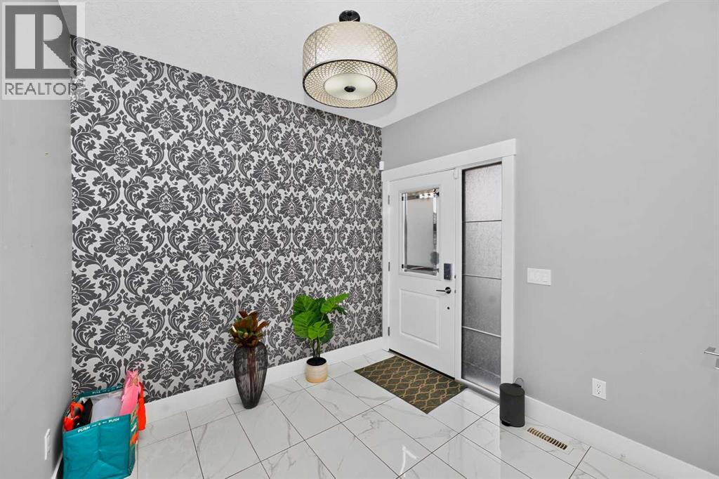 170 Kinniburg Crescent, Chestermere, Alberta  T1X 1Y1 - Photo 4 - A2347830