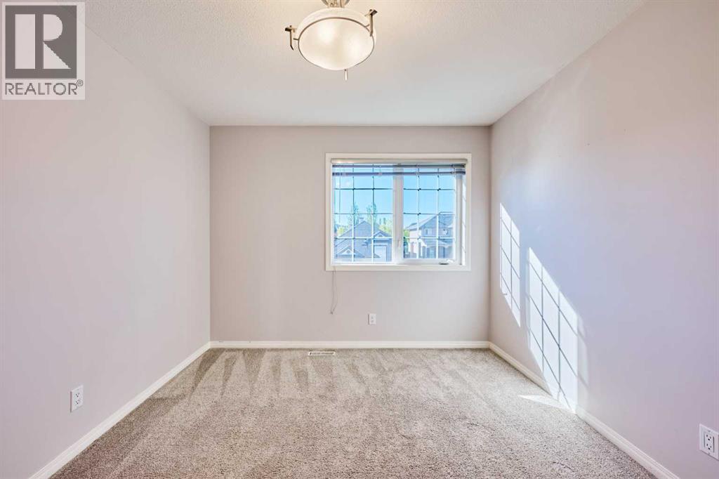 32 Evercreek Bluffs Crescent SW, Calgary, Alberta  T2Y 4P3 - Photo 32 - A2342935