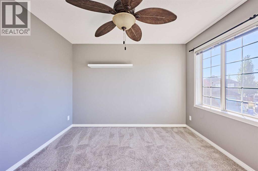 32 Evercreek Bluffs Crescent SW, Calgary, Alberta  T2Y 4P3 - Photo 35 - A2342935