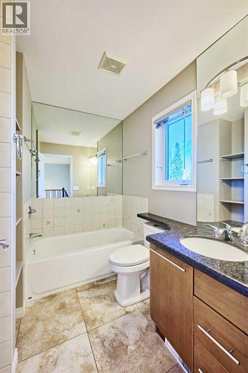 32 Evercreek Bluffs Crescent SW, Calgary, Alberta  T2Y 4P3 - Photo 38 - A2342935