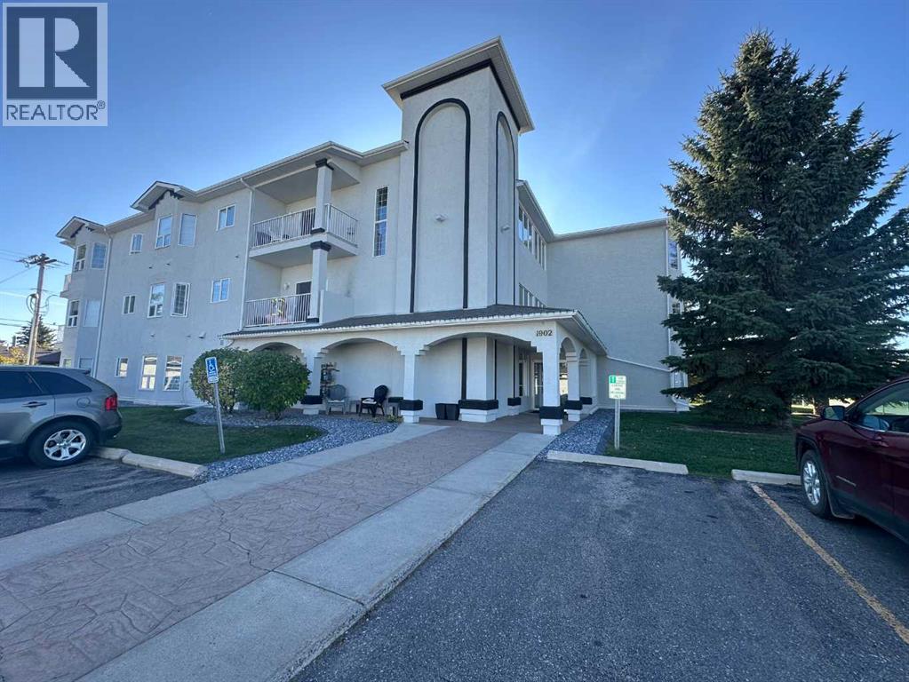 303, 1902 23 Street, Didsbury, Alberta  T0M 0W0 - Photo 1 - A2347146