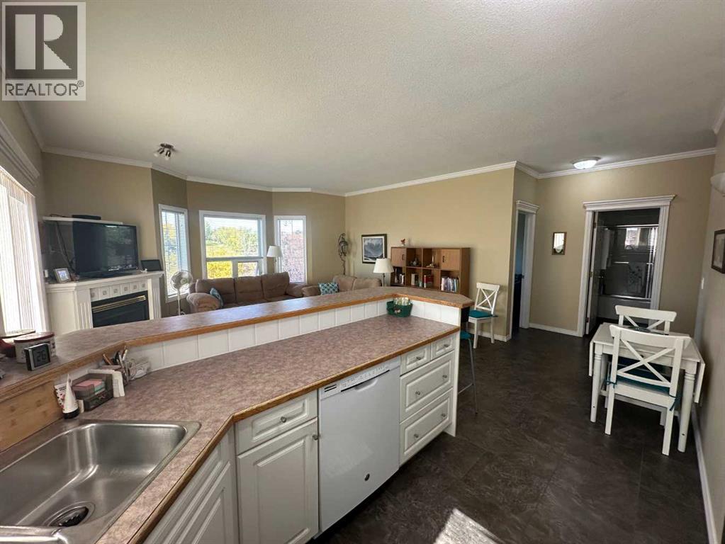 303, 1902 23 Street, Didsbury, Alberta  T0M 0W0 - Photo 4 - A2347146