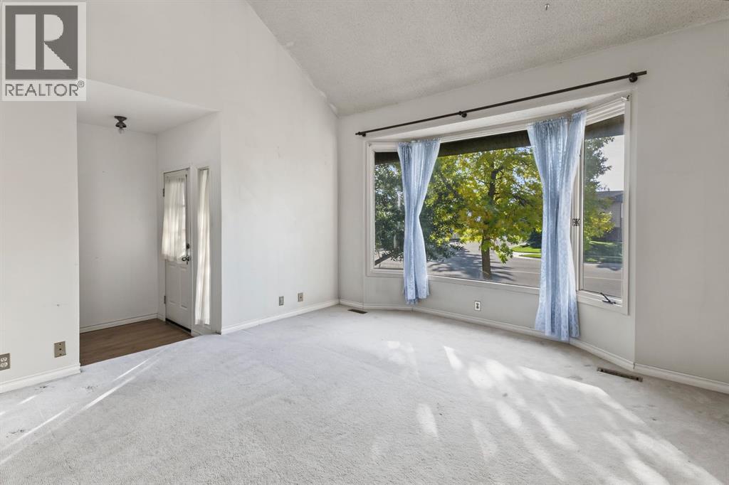 1272 Berkley Drive NW, Calgary, Alberta  T3K 1S9 - Photo 6 - A2342496