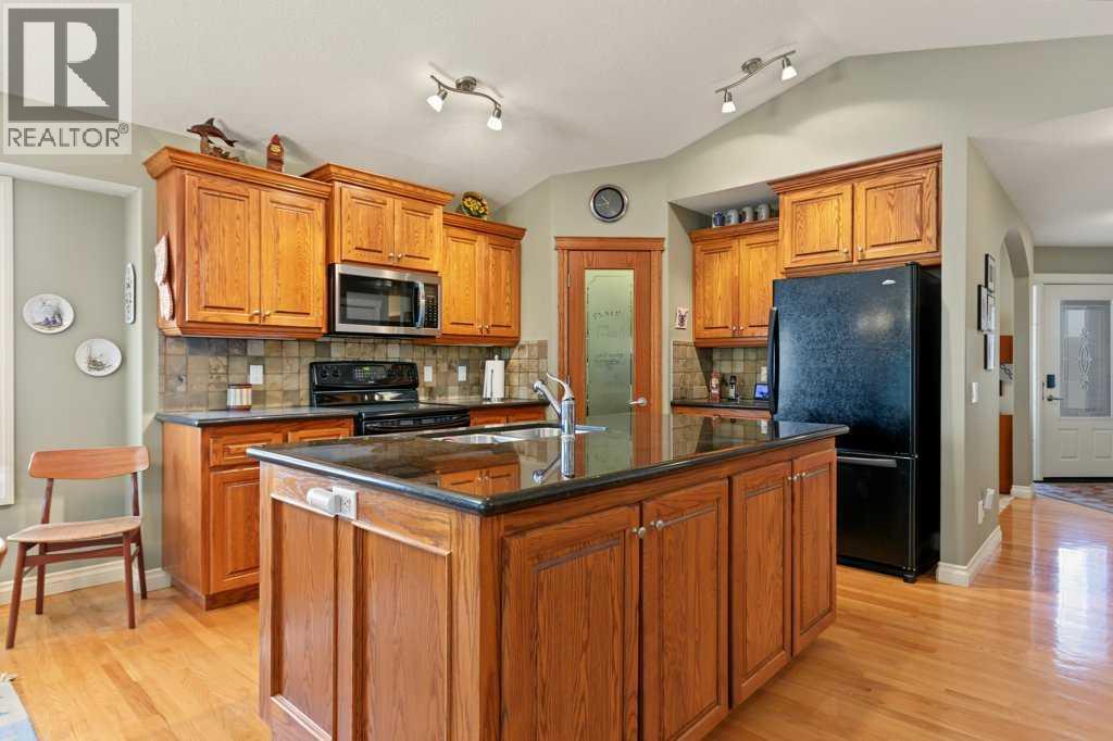 197 Cimarron Drive, Okotoks, Alberta  T1S 0A7 - Photo 6 - A2347540