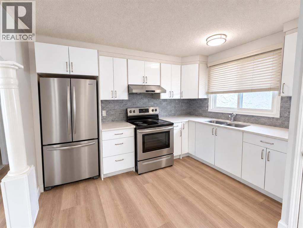 5230 Whitestone Road NE, Calgary, Alberta  T1Y 1T6 - Photo 2 - A2347481