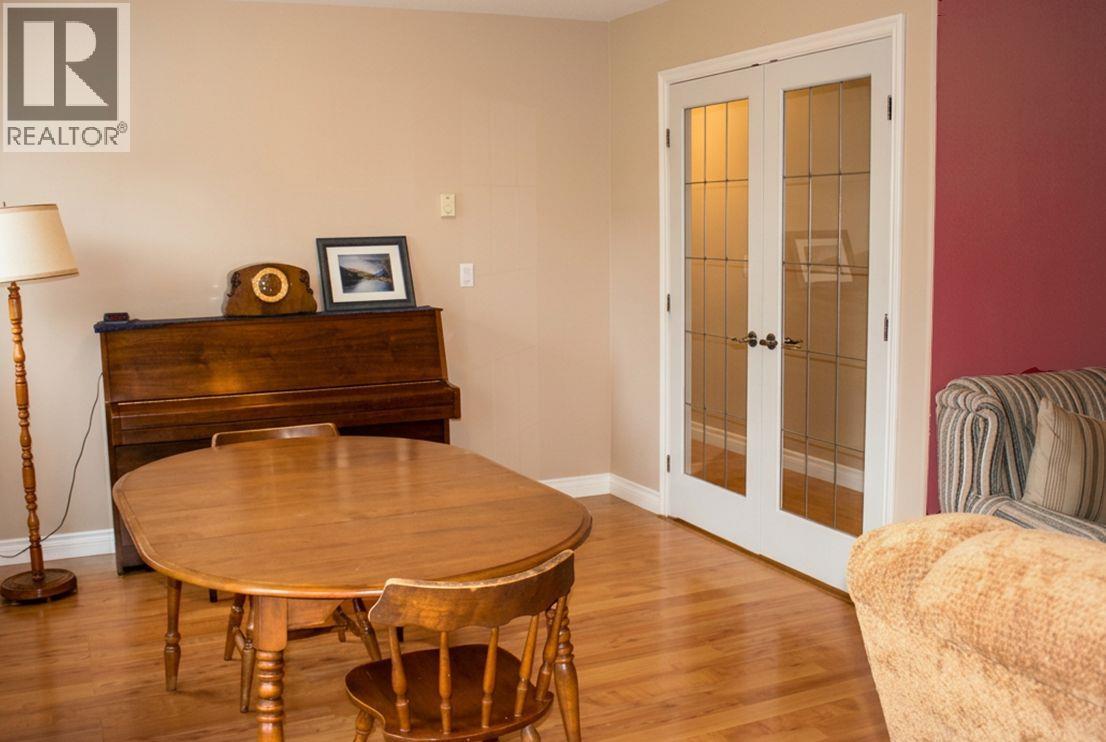 Family room with french doors opens onto Patio