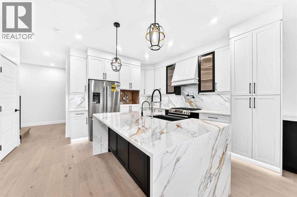 3106 15 Avenue SW, Calgary, Alberta  T3C 0Y6 - Photo 3 - A2347568