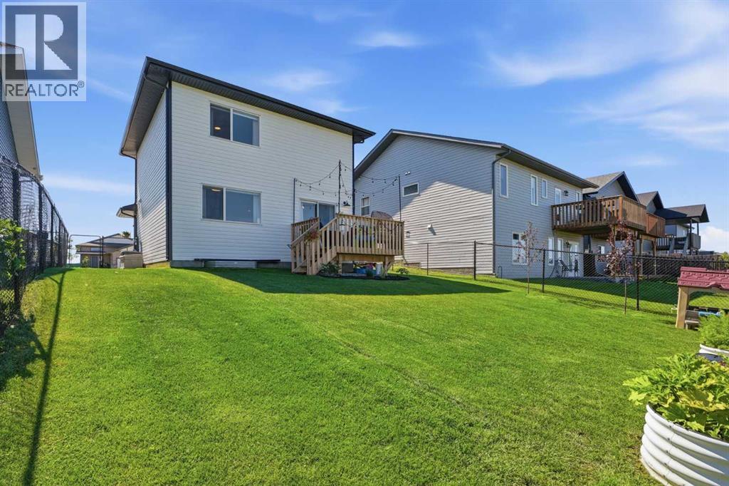 644 Robinson Avenue, Penhold, Alberta  T0M 1R0 - Photo 31 - A2342822