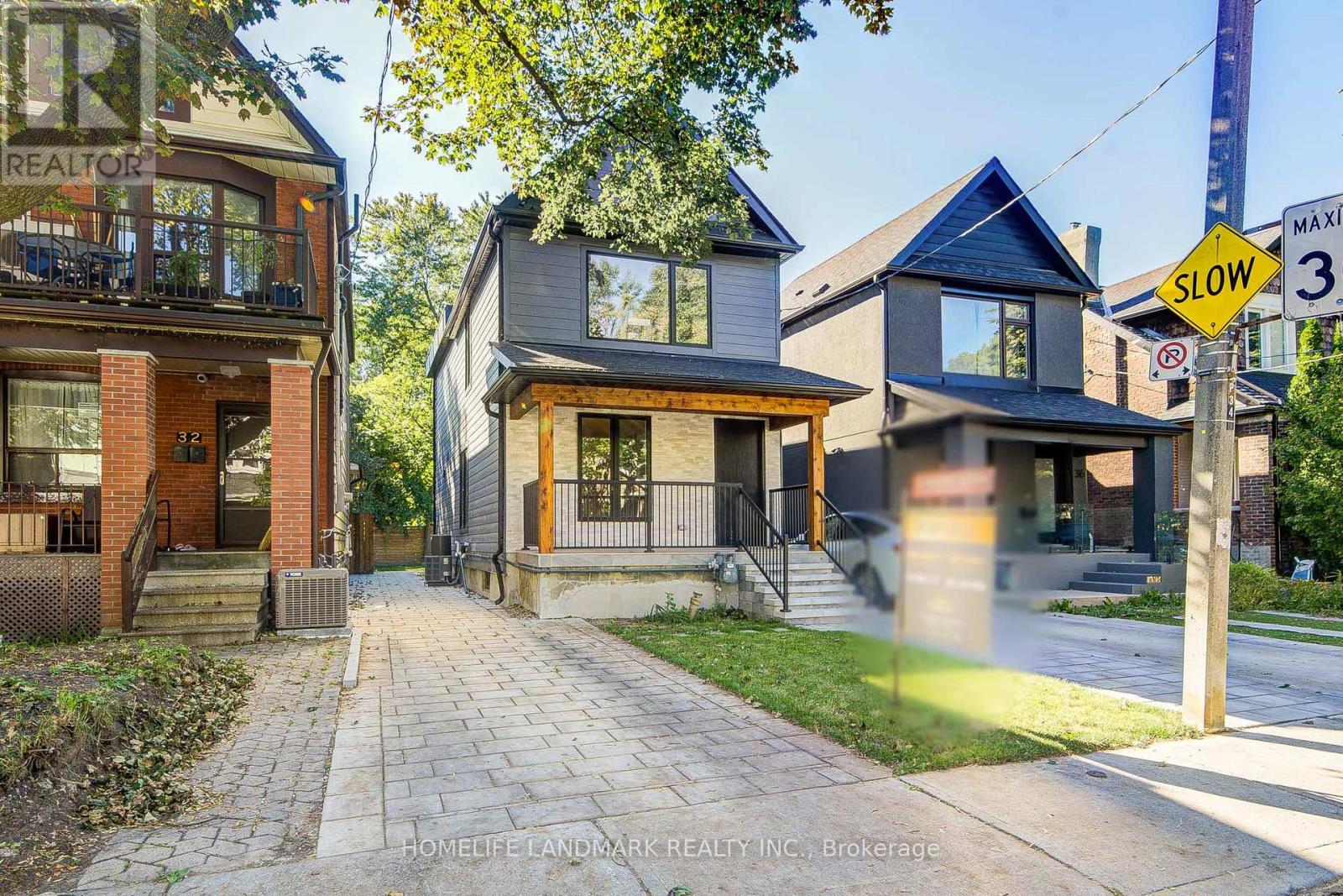 34 Hiawatha Road, Toronto, Ontario  M4L 2X8 - Photo 1 - E13825588