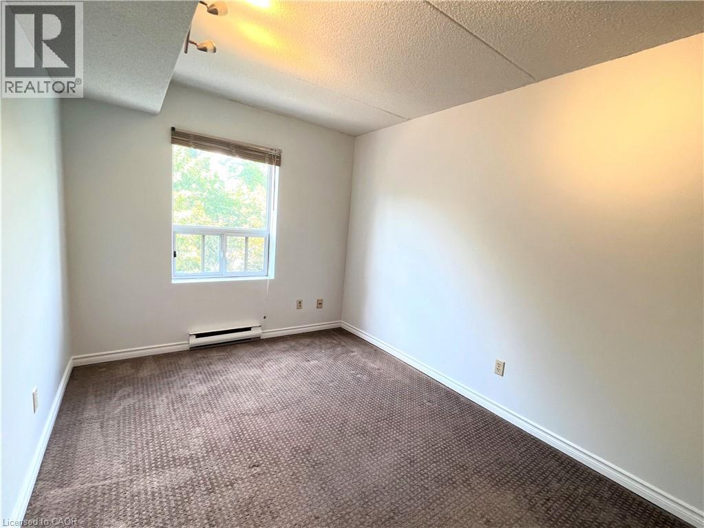 384 W Erb Street Unit# 307, Waterloo, Ontario  N2L 1W6 - Photo 18 - 40863387