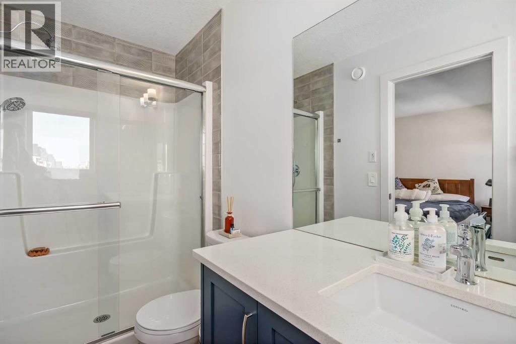 211 Wolf Creek Avenue Se, Calgary, Alberta T2X 4X1 - Photo 20 - A2343542