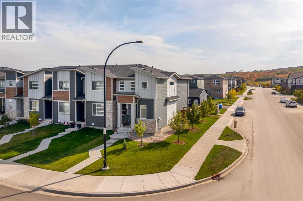 211 Wolf Creek Avenue Se, Calgary, Alberta T2X 4X1 - Photo 4 - A2343542