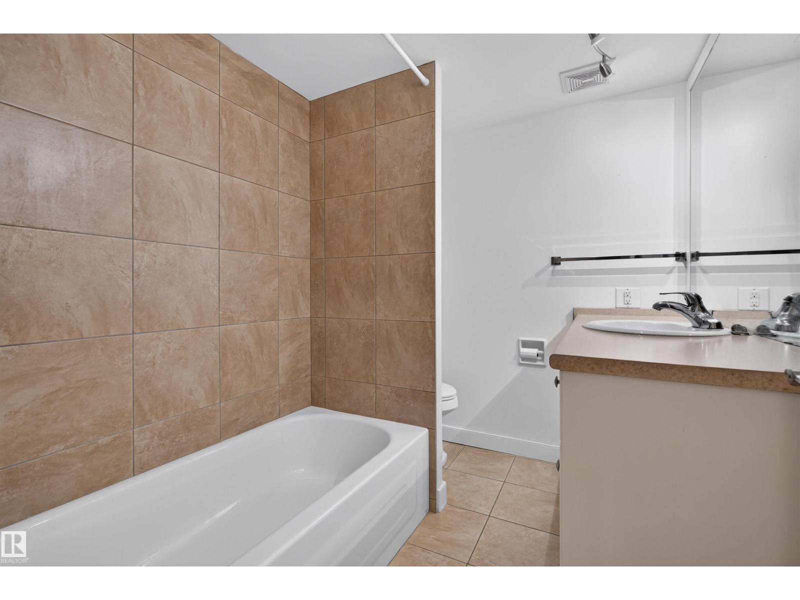 #703 9909 110 ST NW