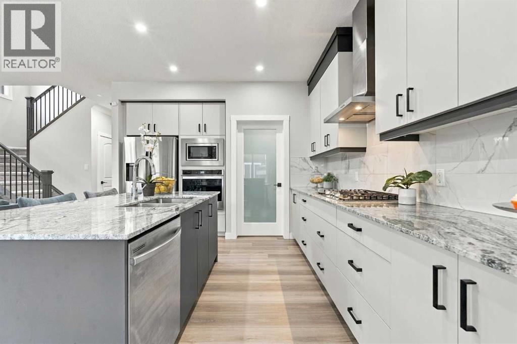 70 Creekside Avenue Sw, Calgary, Alberta  T2X 4A9 - Photo 9 - A2345899