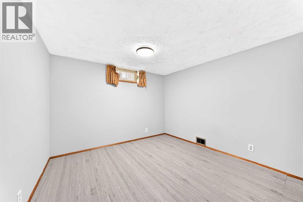 165 Marbrooke Circle Ne, Calgary, Alberta  T2A 2W4 - Photo 24 - A2347281