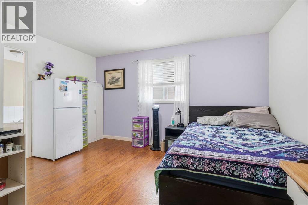 58 Cimarron Meadows Road, Okotoks, Alberta  T1S 1T6 - Photo 19 - A2345308