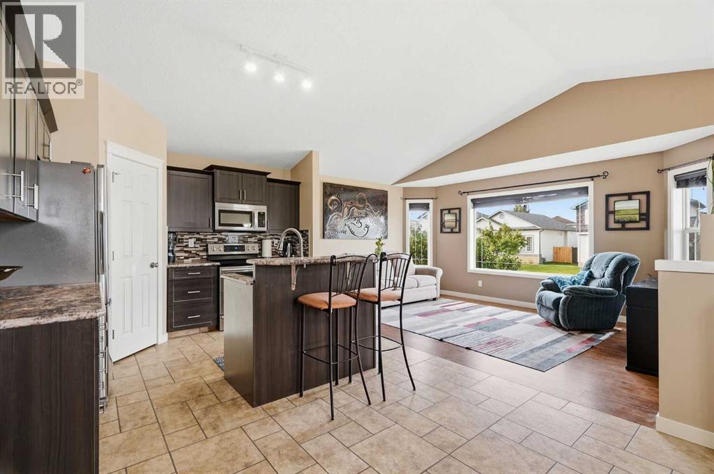 58 Cimarron Meadows Road, Okotoks, Alberta  T1S 1T6 - Photo 11 - A2345308