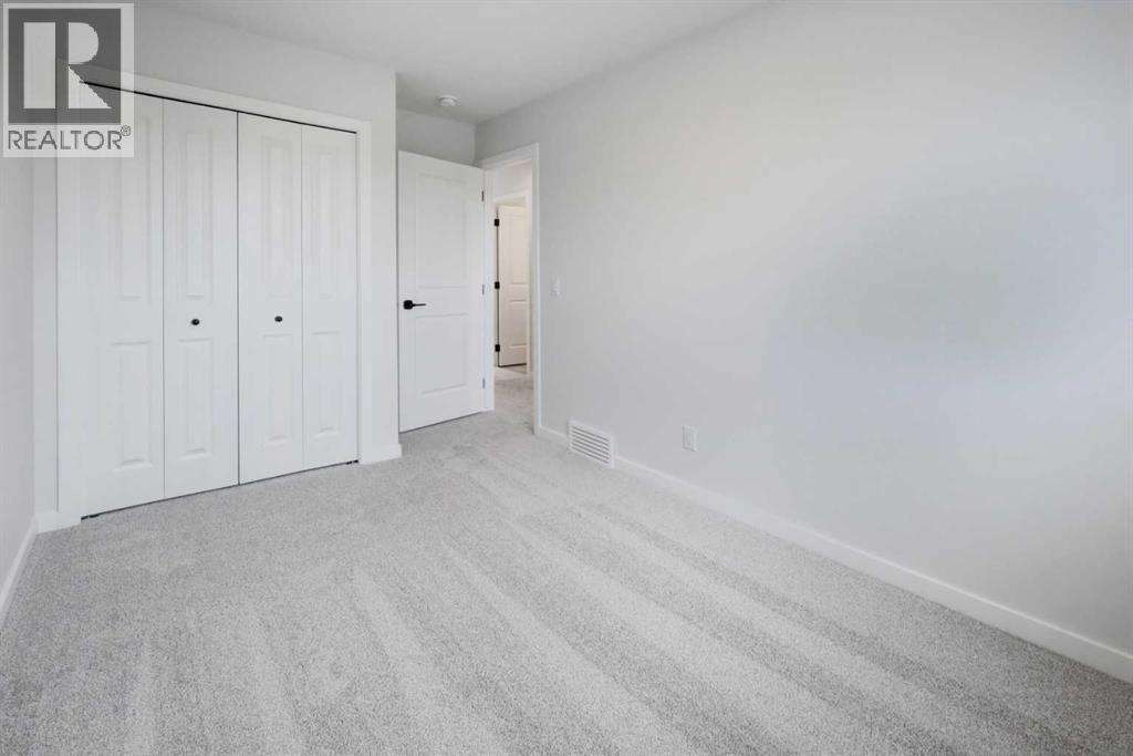 406 Carringvue Grove Nw, Calgary, Alberta  T3P 2L9 - Photo 20 - A2343638