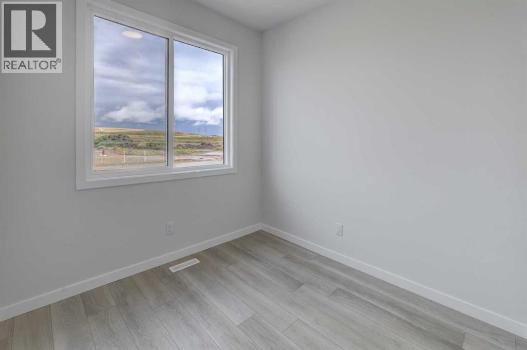 406 Carringvue Grove Nw, Calgary, Alberta  T3P 2L9 - Photo 10 - A2343638